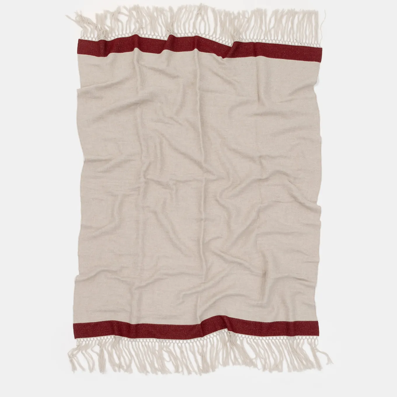 Coperta con frange a banda rossa
