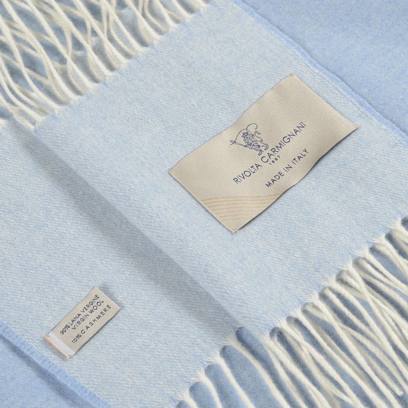 Coperta piccola azzurra con frange Defilé