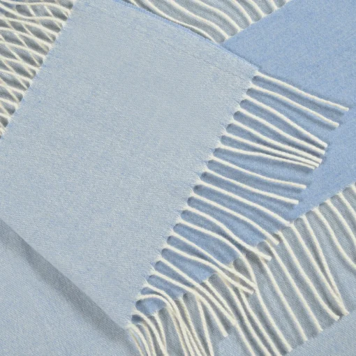 Coperta piccola azzurra con frange Defilé