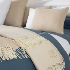 Coperta piccola beige con frange Defilé