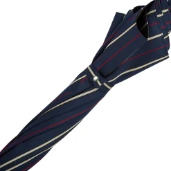 Ombrello a righe con manico in argento a forma di scimmia