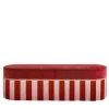 panchina in velluto rosso con frangia bicolore