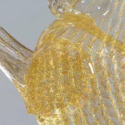 Piccolo cavallo da riproduzione in vetro dorato