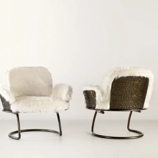 Poltrona anni '70 in pelliccia bianca