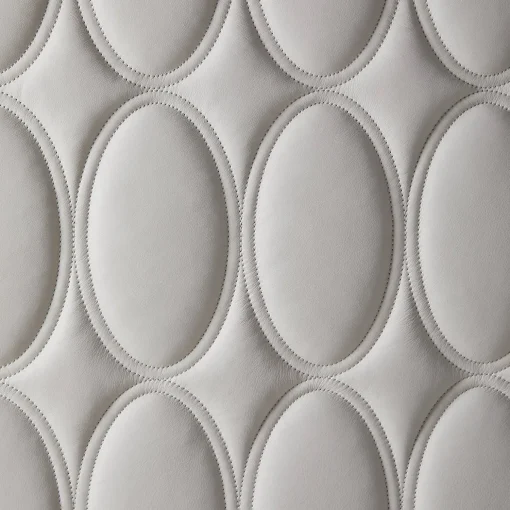 Scrivania Diamond con pelle trapuntata e base in metallo bronzato