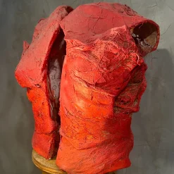 Scultura in terracotta rossa SALVA/gente