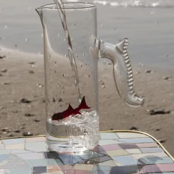 Set di brocca a forma di pesciolino rosso e quattro bicchieri a forma di pesciolino rotondo