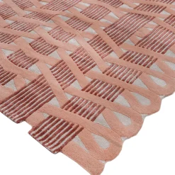 Tappeto in lana nei toni avorio e corallo chiaro