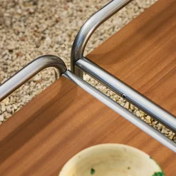 Tavolino Stringa in mogano e acciaio inox di Gae Aulenti