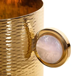 Tazza da tè dorata martellata con piattino