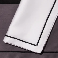 Tovagliette e tovaglioli - Due tonalità di grigio e bianco