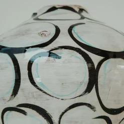 Vaso di manganese e cerchi verde rame