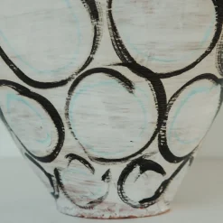 Vaso di manganese e cerchi verde rame